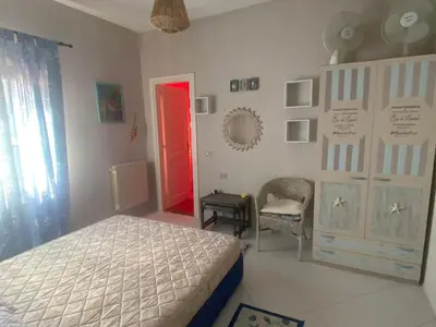 Letto o letti in una camera di Gerani Quadrilocale