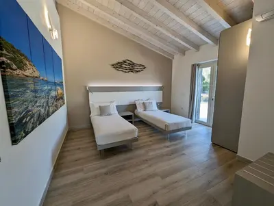 Letto o letti in una camera di Luxury Stunning Seaview Villa by SardiniaGem
