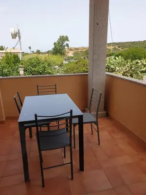 Balcone o terrazza di Capo Figari 8, Appartamento spazioso nel centro di Golfo Aranci con terrazza, Wi-Fi, parcheggio gratuito