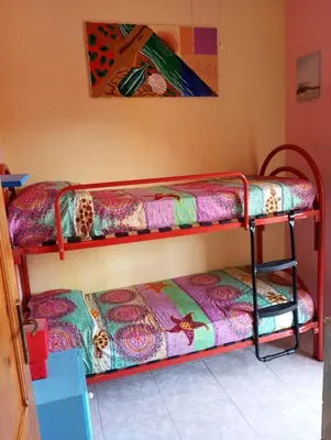 Letto o letti in una camera di Casa vacanze Wally a Posada, Sardegna