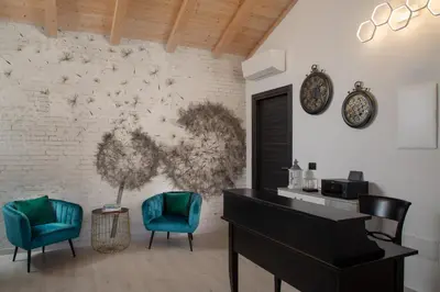 Area soggiorno di Theodore Rooms