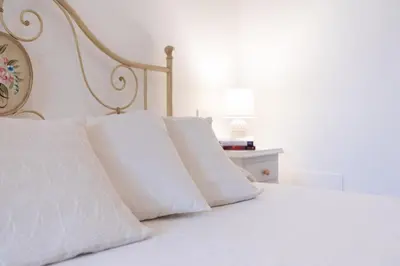 Letto o letti in una camera di Casa Giulia - vacanze a Olbia