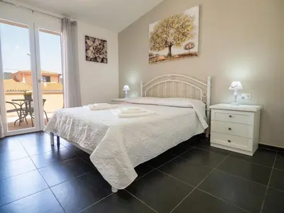 Letto o letti in una camera di SweetHome - MORADA