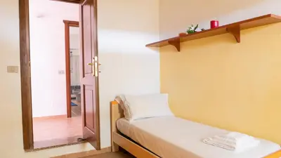 Letto o letti in una camera di Casa L'Alzoni