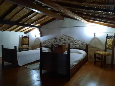 Letto o letti in una camera di Domo Sedda