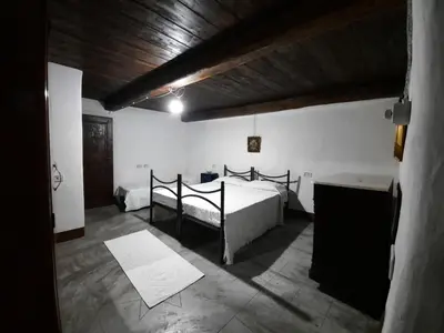 Letto o letti in una camera di Domo Sedda