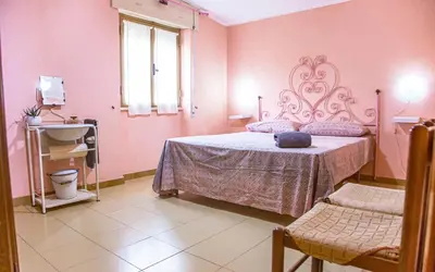 Letto o letti in una camera di Casa Lucia Relax