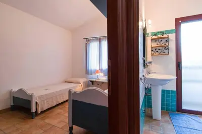 Letto o letti in una camera di Glicine
