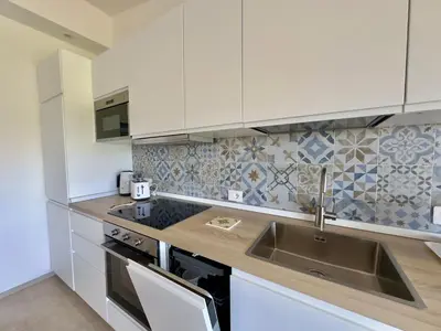 Cucina o angolo cottura di La Finestra sul Mare Seaview Apartments