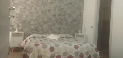 Letto o letti in una camera di Affittacamere Dolci Notti