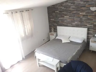 Letto o letti in una camera di Affittacamere Dolci Notti