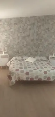 Letto o letti in una camera di Affittacamere Dolci Notti