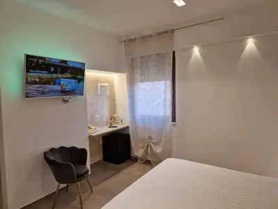 Letto o letti in una camera di Summerhouse