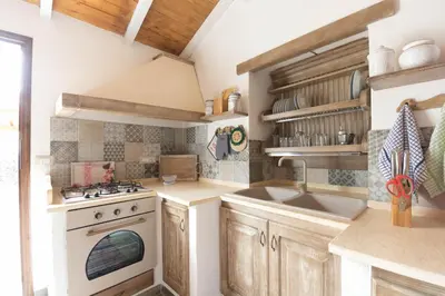 Cucina o angolo cottura di Villa Jumpadu
