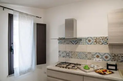 Cucina o angolo cottura di Affittacamere Su Portzu