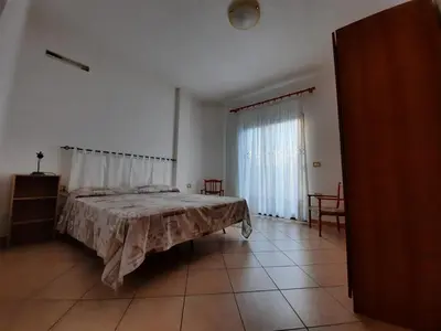 Letto o letti in una camera di Domo Vèdele