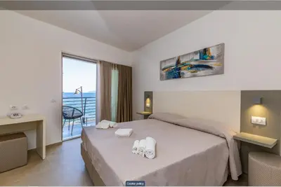 Letto o letti in una camera di Hotel Caramare