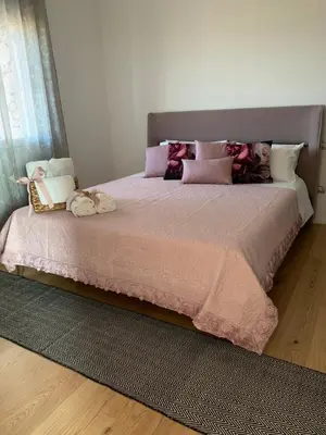 Letto o letti in una camera di RELAIS NANNI HOME