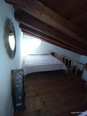 Letto o letti in una camera di casetta Leonardo