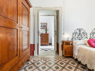 Letto o letti in una camera di PALAZZO CHERCHI