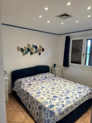 Letto o letti in una camera di Comfort e panorama mozzafiato a Golfo Aranci