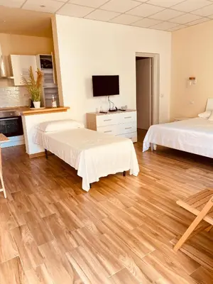 Letto o letti in una camera di Casa Maka'