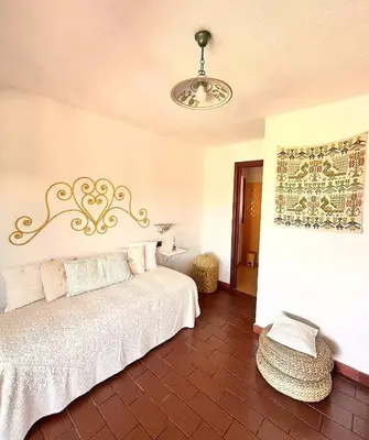 Letto o letti in una camera di Suite Suliana