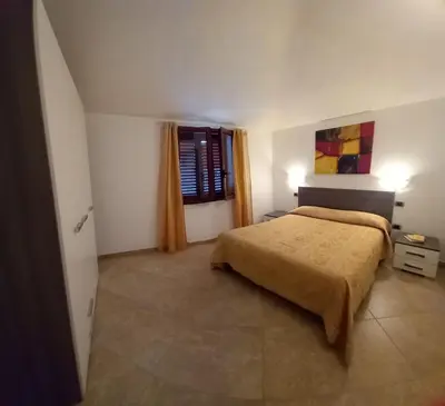 Letto o letti in una camera di Casa Panoramica