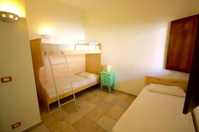 Letto o letti in una camera di Residenza Sardegna da amare