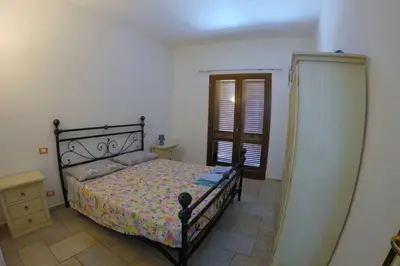 Letto o letti in una camera di Residenza Sardegna da amare