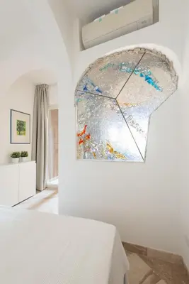 Letto o letti in una camera di Sherden suites - Your House in Sardinia