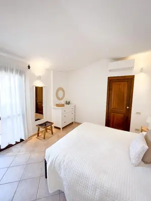 Letto o letti in una camera di Casa Carmen - Attico vista mare