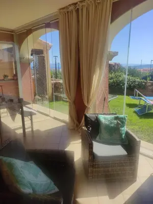 Area soggiorno di Residence Cala Moresca 15