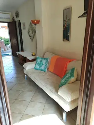 Area soggiorno di Residence Cala Moresca 15