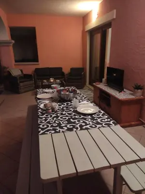 TV o dispositivi per l'intrattenimento presso Residence Cala Moresca 15