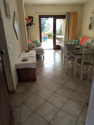 Area soggiorno di Residence Cala Moresca 15