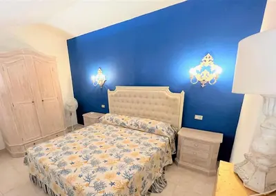 Letto o letti in una camera di ISS Travel, San Teodoro 1 - 100 m from Cala d'Ambra Beach