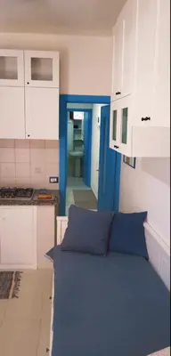 Cucina o angolo cottura di Villa Vera trifamigliare con ingresso diretto 20 mt al mare clima wi-fi bbq