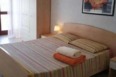 Letto o letti in una camera di Appartamenti Marilu