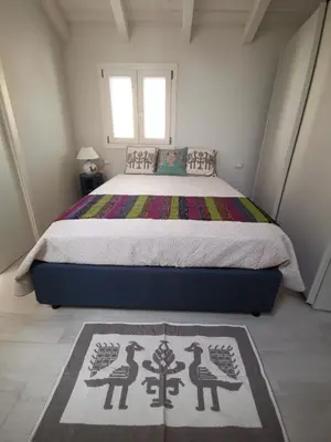 Letto o letti in una camera di Domu noa