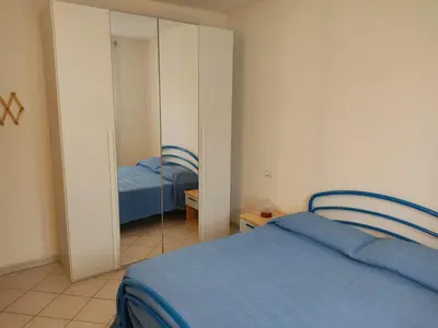 Letto o letti in una camera di Appartamento a La Caletta