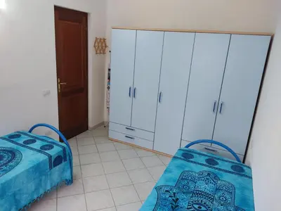 Letto o letti in una camera di Appartamento a La Caletta