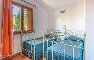 Letto o letti in una camera di Trilo 6