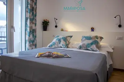 Letto o letti in una camera di Affittacamere Mariposa