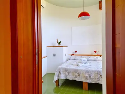 Letto o letti in una camera di Villa dei Pini - Villa indipendente di design a pochi passi dal mare
