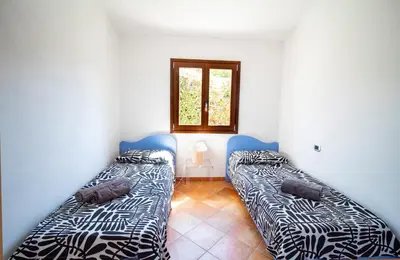 Letto o letti in una camera di Villa Gallura Dream