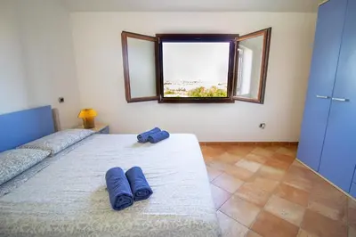 Letto o letti in una camera di Villa Gallura Dream