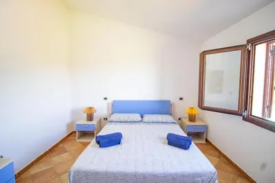 Letto o letti in una camera di Villa Gallura Dream