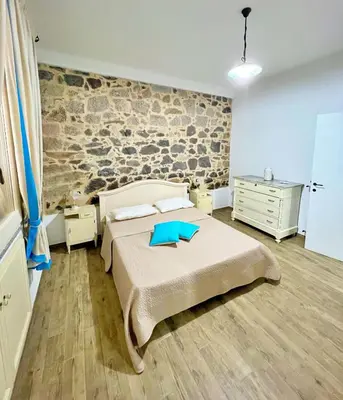 Letto o letti in una camera di Sa Domo de Tzia Elene