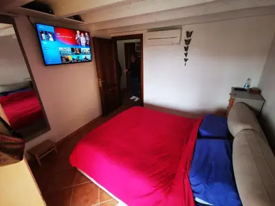 TV o dispositivi per l'intrattenimento presso Villetta L'affaccio sul mare